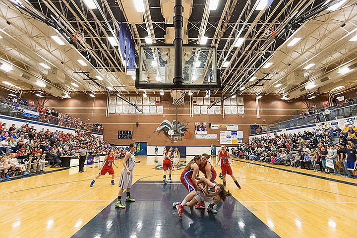 &lt;p&gt;Lilly Kelly, of Timberlake goes to the floor of the court while wrestling a pair of Filer players for a loose ball under the basket during the second half.&lt;/p&gt;