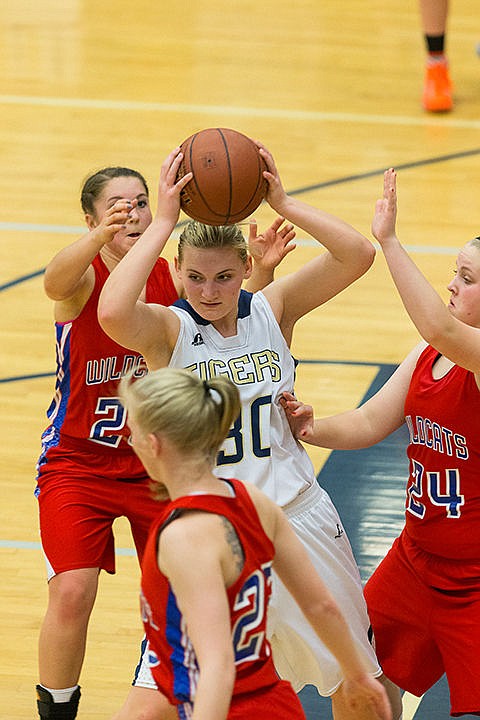 &lt;p&gt;Timberlake&#146;s Carleen Simpson keeps the ball out of the reach of Filer defenders in the fourth quarter on Friday.&lt;/p&gt;