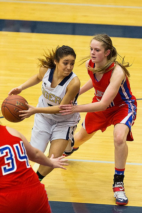 &lt;p&gt;Timberlake&#146;s Reina Powell forces her way past Filer defender Haley Ackerman in the fourth quarter on Friday afternoon.&lt;/p&gt;