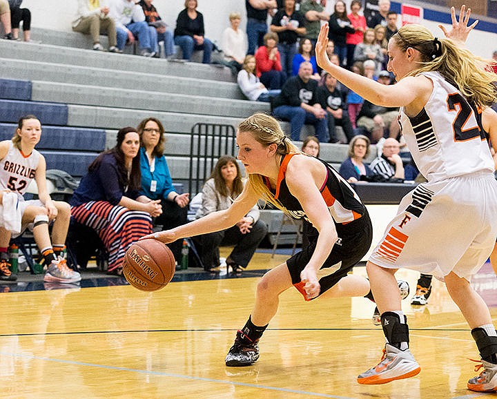 &lt;p&gt;Priest River&#146;s Angel Clark dribbles around Fruitland defender Mackenzie Collins in the first half on Friday.&lt;/p&gt;