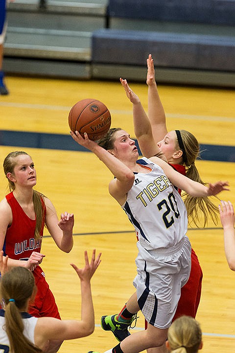 &lt;p&gt;Timberlake&#146;s Allison Kirby goes above Filer defenders to put up a third quarter score.&lt;/p&gt;