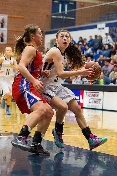 &lt;p&gt;Timberlake High&#146;s Lilly Kelly makes a move around Filer&#146;s Sidney Koyle before taking a shot in the first half on Friday.&lt;/p&gt;