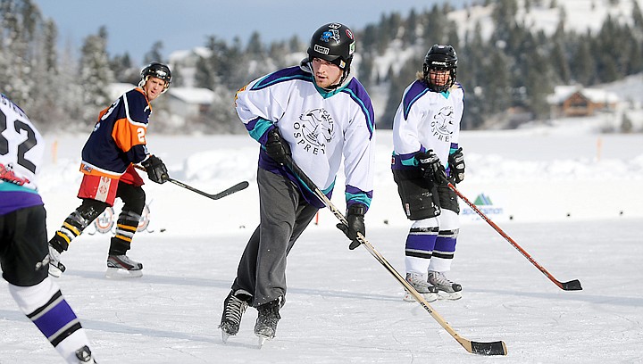 &lt;p&gt;A member of the McCall Osprey's chases the play in the game against the Le PampleMousse?! during their match up in the Just for Fun Over 35 division on Friday morning, February 21, at the Montana Pond Hockey Classic at Foy's Lake. (Brenda Ahearn/Daily Inter Lake)&lt;/p&gt;