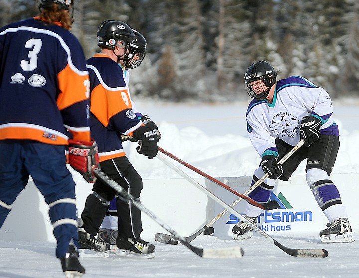 &lt;p&gt;A member of the McCall Osprey's faces a line of Le PampleMousse?! during their match up in the Just for Fun Over 35 division on Friday morning, February 21, at the Montana Pond Hockey Classic at Foy's Lake. (Brenda Ahearn/Daily Inter Lake)&lt;/p&gt;