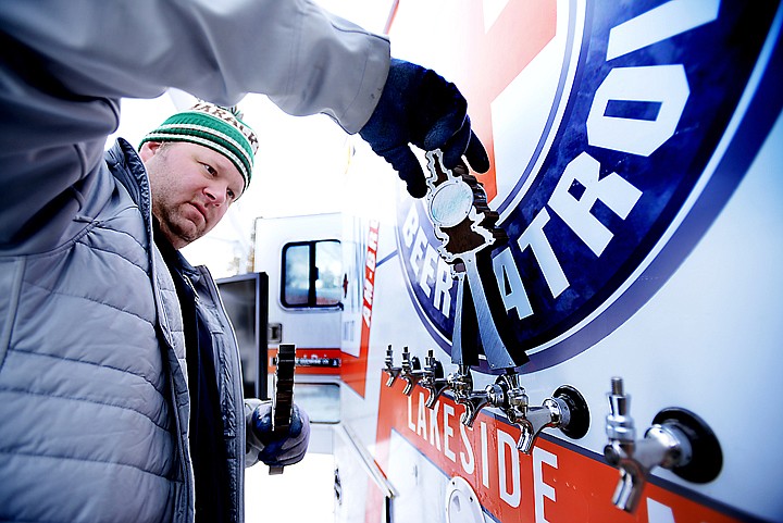 &lt;p&gt;Josh Townsley of the Tamarack Brewing Company sets up the taps on the Beer Patrol on Friday, February 21, at the Montana Pond Hockey Classic at Foy's Lake. (Brenda Ahearn/Daily Inter Lake)&lt;/p&gt;