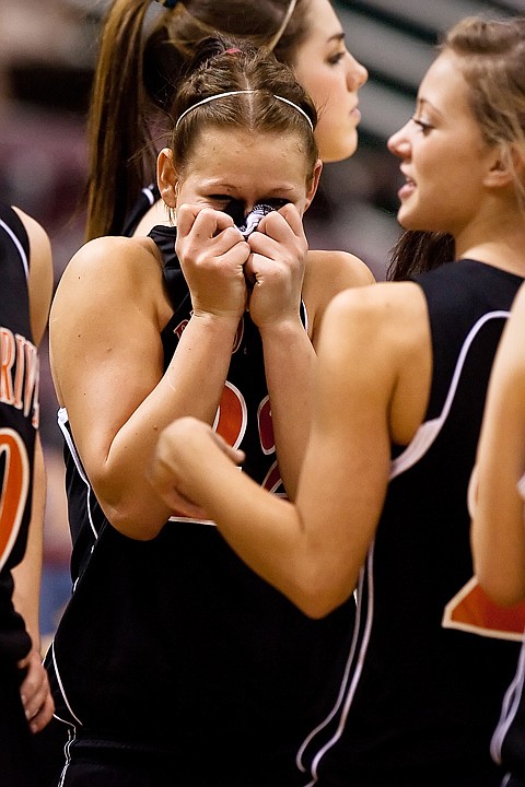 &lt;p&gt;Samantha Stokes, of Priest River, celebrates winning the 3A state basketball title Saturday with team mates.&lt;/p&gt;