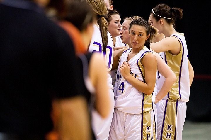 &lt;p&gt;Kellogg's Hayley Young holds back tears Saturday after losing to Priest River in the 3A girls state basketball title game in Nampa.&lt;/p&gt;