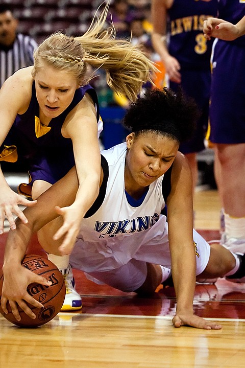 &lt;p&gt;Kendalyn Brainard, of Coeur d'Alene, fights for a loose ball Saturday in the second quarter of state basketball action in Nampa.&lt;/p&gt;