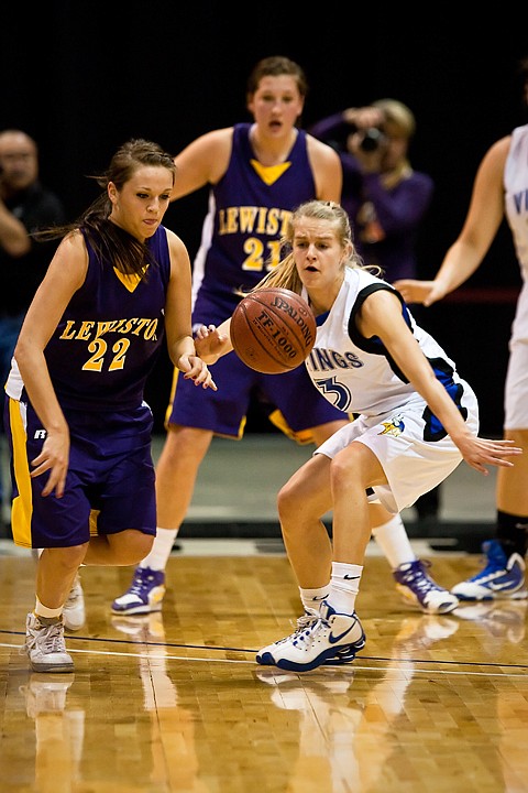 &lt;p&gt;Coeur d'Alene's Amanda Buttrey knocks the ball lose from Tanis Fuller, of Lewiston, in the first quarter of state basketball play.&lt;/p&gt;