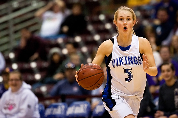 &lt;p&gt;Coeur d'Alene's Dayna Drager drives the ball down the court during the state basketball championship game.&lt;/p&gt;