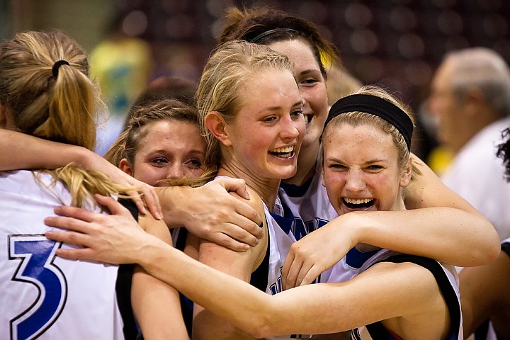 &lt;p&gt;The Lady Vikings form a hug around Dayna Drager Saturday after winning the 2010 Idaho state basketball championship in Nampa.&lt;/p&gt;