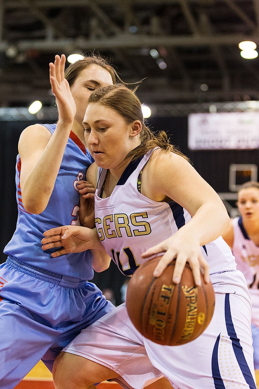 &lt;p&gt;SHAWN GUST/Press Timberlake&#146;s Kaylee Jezek drives to the basket against Marsh Valley&#146;s Katie Anderson during the first quarter in Nampa.&lt;/p&gt;