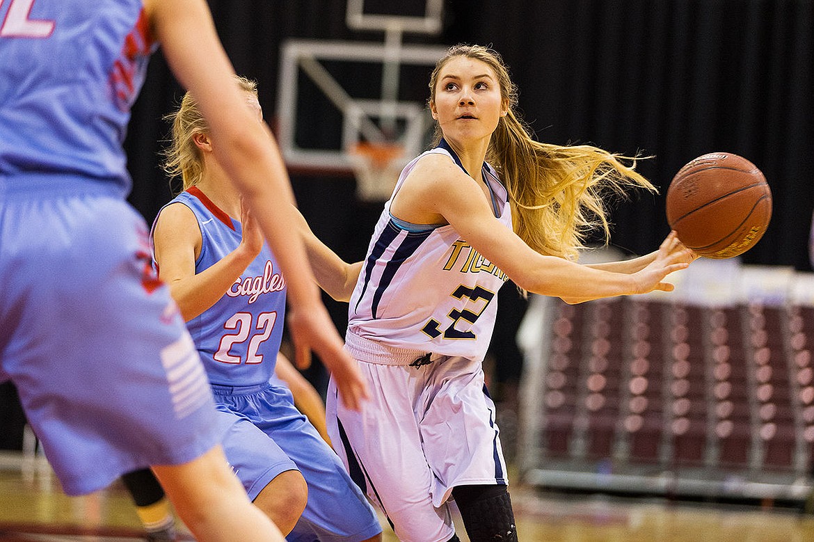 &lt;p&gt;SHAWN GUST/Press Timberlake&#146;s McKeeley Tonkin concentrates on the basket while making a pass Saturday at the Ford Idaho Center.&lt;/p&gt;