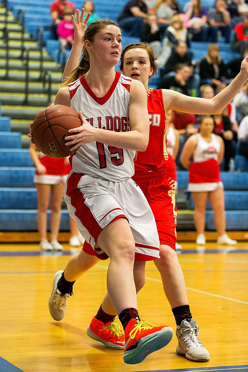 &lt;p&gt;SHAWN GUST/Press Sandpoint&#146;s BreLynn Converse looks for passing options during the fourth quarter.&lt;/p&gt;