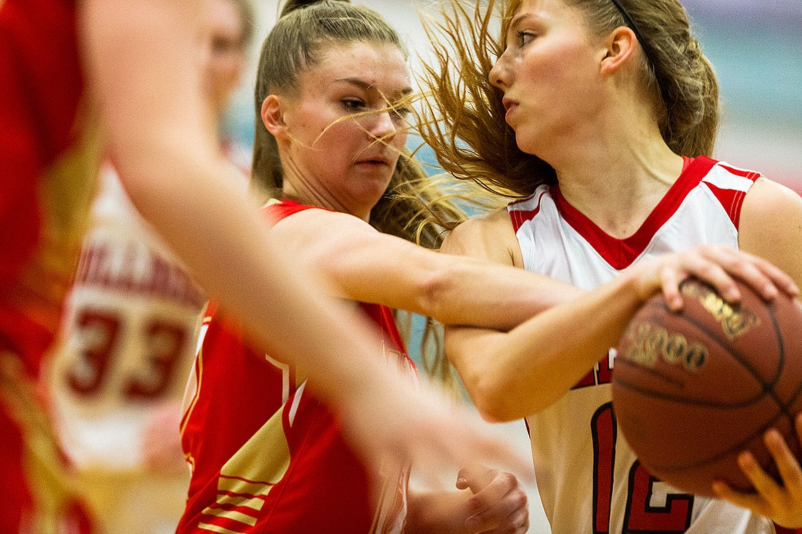 &lt;p&gt;SHAWN GUST/Press Sandpoint High&#146;s Madi Schoening is fouled by a Minico defender during the second half on Saturday.&lt;/p&gt;