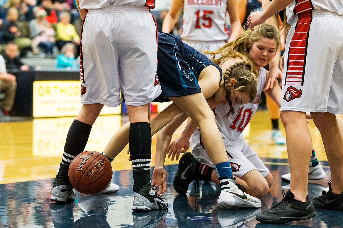 &lt;p&gt;SHAWN GUST/Press Lake City High School&#146;s Kate Maryon fights for possession of a loose ball during the first quarter.&lt;/p&gt;