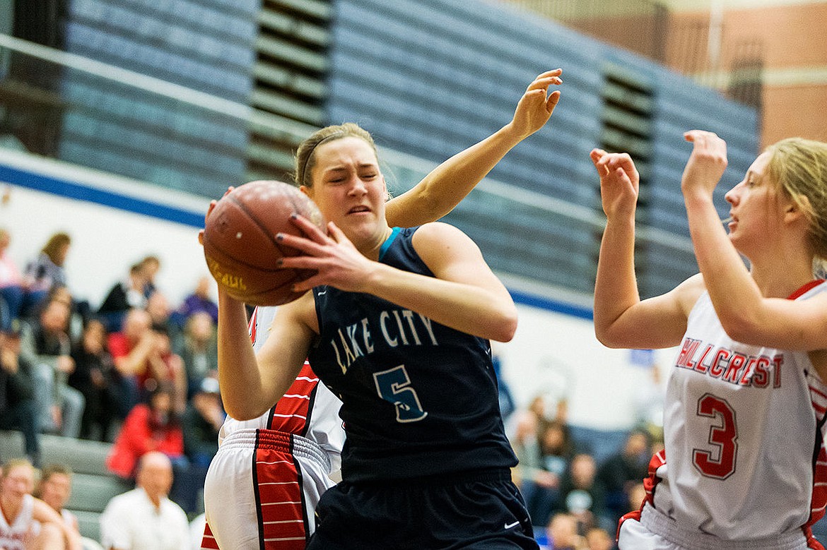 &lt;p&gt;SHAWN GUST/Press Lake City&#146;s Bridget Rieken battle past Hillcrest defenders to take a shot in the second quarter.&lt;/p&gt;