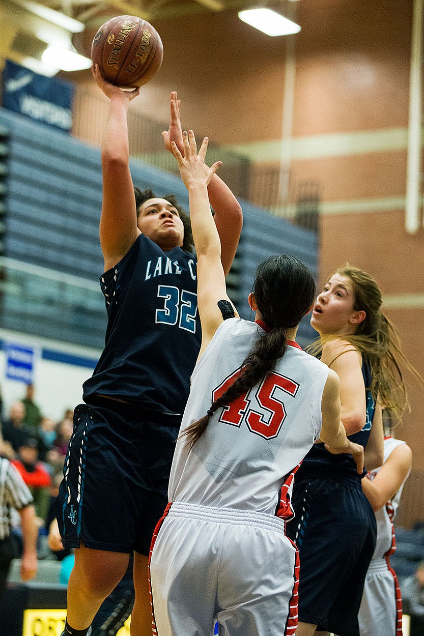 &lt;p&gt;SHAWN GUST/Press Lake City&#146;s Keara Simpson (32) shoots over Hillcrest&#146;s Madelyn Biddulph (45) during the first half at Skyview.&lt;/p&gt;