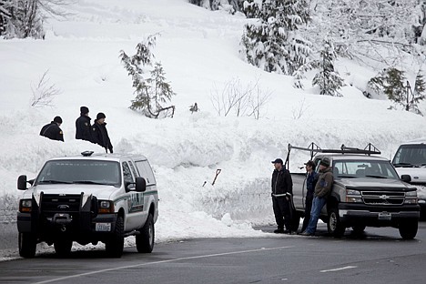 &lt;p&gt;AP Photo/The Seattle Times, Erika Schultz King County Sheriff's officers and other emergency officials work along Highway 2 near Stevens Pass ski resort in Skykomish, Wash., near where three skiers were killed in an avalanche Sunday. The avalanche swept the three skiers about a quarter-mile down an out-of-bounds canyon at the popular resort. A fourth skier caught up in the slide was saved by a safety device, authorities said.&lt;/p&gt;