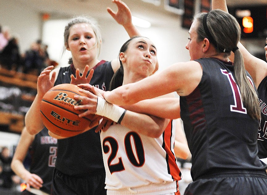 &lt;p&gt;Flathead's Johanna Lembke is hammered by Helena High's Jenna Starke during the second quarter of Friday&#146;s Western AA girls basketball game at Flathead High School. (Aaric Bryan/Daily Inter Lake)&lt;/p&gt;