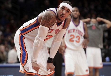 &lt;p&gt;FILE - In this Jan. 16, 2012, file photo, New York Knicks' Carmelo Anthony looks on during the second half of an NBA basketball game agains the Orlando Magic in New York. Before they fell in love with Jeremy Lin, Knicks fans adored the Brooklyn-born Anthony. It's been exactly a year since the Knicks acquired him from Denver. Anthony hasn't made the anticipated impact, and his return from injury Monday revived questions about whether the team is better off without him. (AP Photo/Seth Wenig, File)&lt;/p&gt;