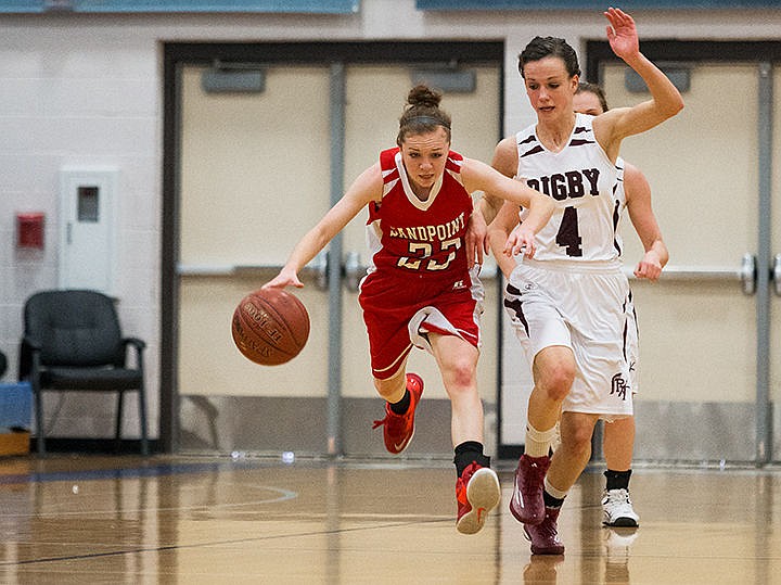 &lt;p&gt;Sandpoint&#146;s Riley Couch takes a big stride to make space from Rigby defender Randi Abbott during the second quarter of the third place game of the state 4A girls basketball tournament Saturday in Boise.&lt;/p&gt;