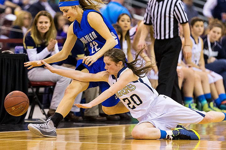 &lt;p&gt;Allison Kirby, of Timberlake, falls to the floor while racing Hanna Larson, of Sugar-Salem, for a loose ball during the second quarter.&lt;/p&gt;