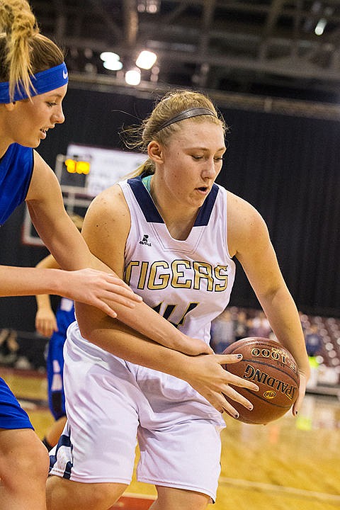 &lt;p&gt;Timberlake&#146;s Kaylee Jezek is fouled by a Sugar-Salem defender while driving to the basket during the second quarter.&lt;/p&gt;