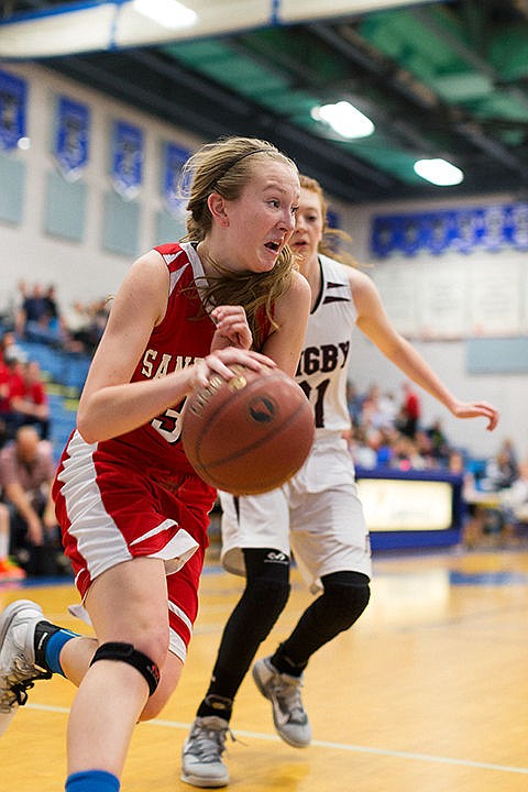 &lt;p&gt;The Bulldogs&#146; Grace Kirscher dribbles along the baseline towards the basket during the second half.&lt;/p&gt;