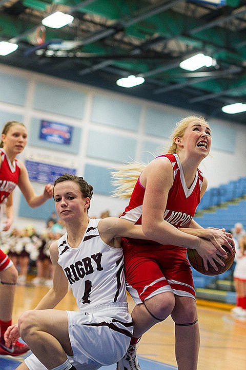 &lt;p&gt;Sandpoint&#146;s Lily Martin is fouled by Rigby&#146;s Randi Abbott while putting up a shot Saturday in the third quarter.&lt;/p&gt;