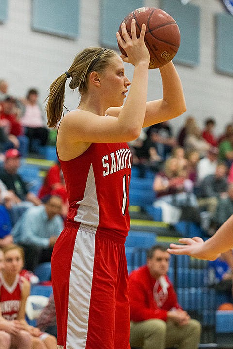 <p>Sandpoint Highs Elani Williams weighs her option during a second half inbound.</p>