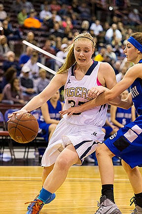 &lt;p&gt;The lady Tigers&#146; Keelie Lawler is fouled by Sugar-Salem High&#146;s Hannah Crane while dribbling along the baseline in the first half.&lt;/p&gt;