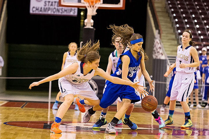 &lt;p&gt;Timberlake&#146;s Anna Gardom reaches in to disrupt Sugar-Salems High&#146;s Ciera Stoddard&#146;s dribbling during the second half in Nampa.&lt;/p&gt;