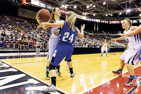 &lt;p&gt;Timberlake guard Payten Rhodes passes the ball around Sugar-Salem&#146;s Jessie Harris in the fourth quarter of the 2015 state 3A girls basketball championship game Saturday at the Idaho Center in Nampa.&lt;/p&gt;