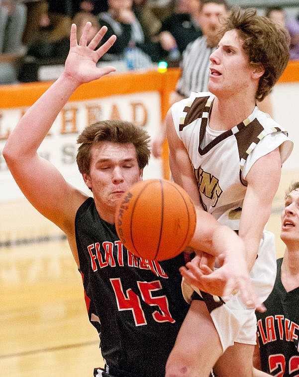 &lt;p&gt;Flathead senior Adam Bradley (45) fouls Helena Capital senior Hunter Beto as he goes up for a shot Saturday afterrnoon at Flathead High School.&lt;/p&gt;