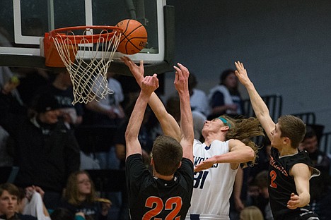 &lt;p&gt;Lake City senior Jacob Dahl lays up the ball during Friday&#146;s 5A Region 1 tournament game vs. Post Falls.&lt;/p&gt;