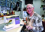 Olsen selling shop; keeps repair business