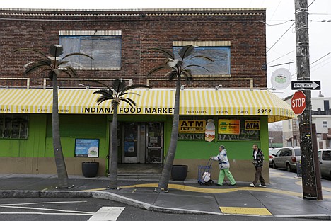 &lt;p&gt;Customers walk to the the Indiana Food Market Jan. 15 in Philadelphia.&lt;/p&gt;