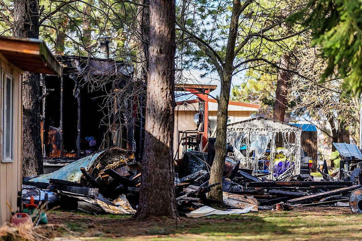 &lt;p&gt;Charred remnants litter the back yard of a mobile home on W. Iron Horse Circle after an early morning fire Monday at the Post Falls home.&lt;/p&gt;