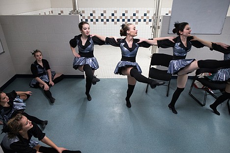 &lt;p&gt;Lake City Hawk Synergy dancers Heather Shields, left, Shelby Senn, middle, and Hannah Price practice their kick routine Saturday before competing for a chance to go to state.&lt;/p&gt;