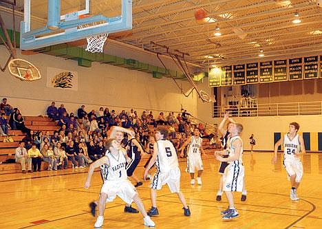 &#151;Photo by TERRI IVIE&lt;br&gt;The Badgers were everywhere on the court both offensively and defensively which was the key to their win over the Priest River Spartans, 67-60 in district play on Feb. 17.