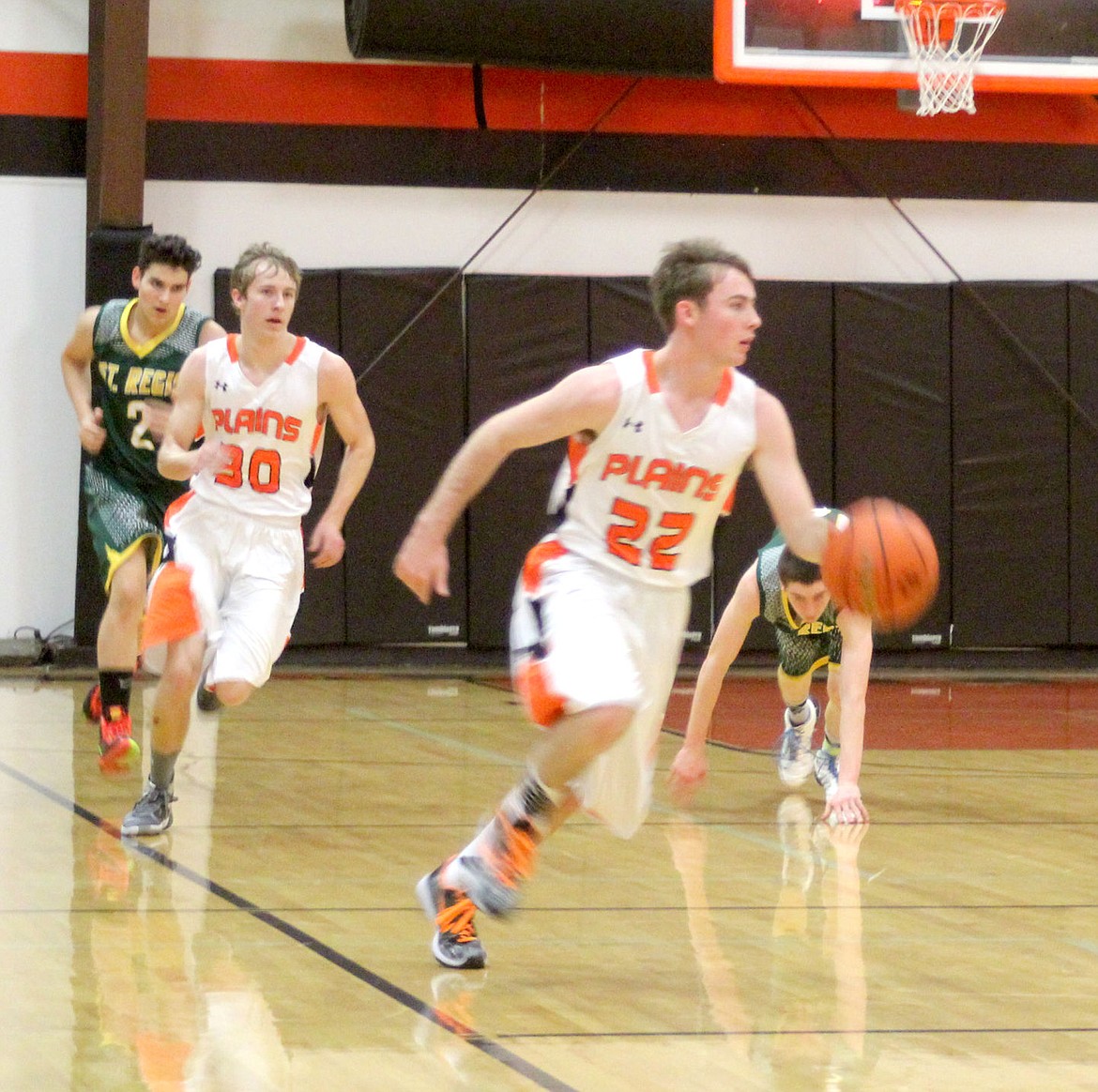 &lt;p&gt;&lt;strong&gt;Alec Cole moves the ball down the court after a rebound during a game between the Horsemen and St. Regis Tigers.&lt;/strong&gt;&lt;/p&gt;