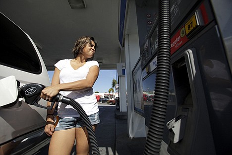 &lt;p&gt;In this Feb. 17 photo, Deborah Aguila fills up her car at a gas station, in San Diego. Retail gasoline prices jumped 3 cents to a national average of $3.61 a gallon on Thursday.&lt;/p&gt;