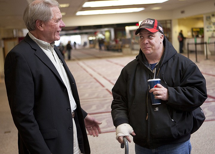 &lt;p&gt;George Vincent, right, talks with Dan Handlin, the pilot of the plane that brought Vincent's service dog to Glacier Park International Airport Friday afternoon.&lt;/p&gt;