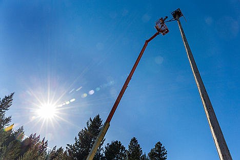 &lt;p&gt;Matt Powers finishes the installment on the first of three osprey cameras on Monday.&lt;/p&gt;