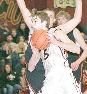 &lt;p&gt;Senior Ryan Rayson drives in for two on a Eureka turnover in the
first quarter, 9-8 advantage Troy.&lt;/p&gt;