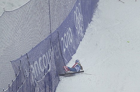 &lt;p&gt;Lindsey Vonn lays in the snow after crashing during the first run of the giant slalom Wednesday at Whistler, British Columbia.&lt;/p&gt;