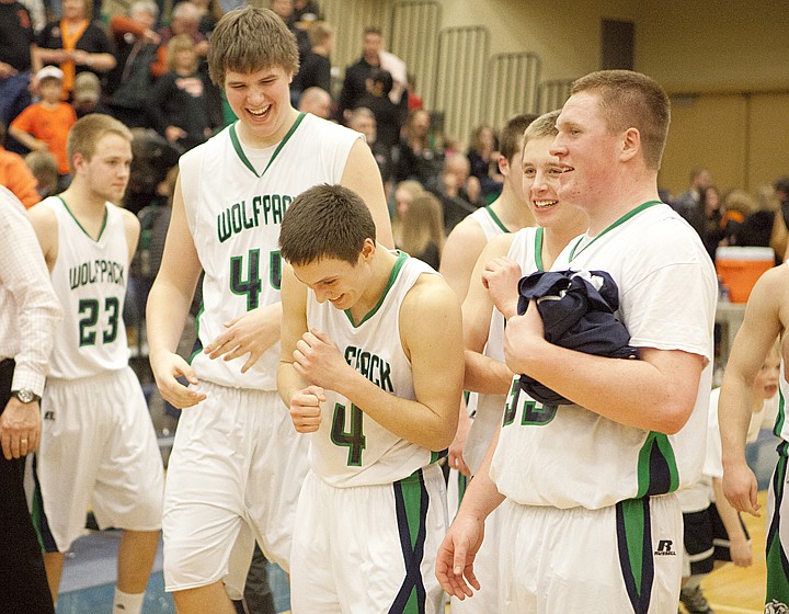 &lt;p&gt;The Glacier boys celebrate after their victory over Flathead in the second crosstown matchup of the season at Glacier High School Friday night.&lt;/p&gt;