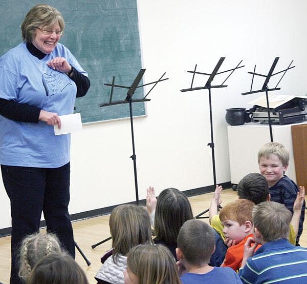 Canda Harbaugh/The Western News Loretta Chavez prepares Kootenai Valley Christian School students Tuesday for a Reader's Theater performance of the children's book &quot;Stone Soup.&quot;