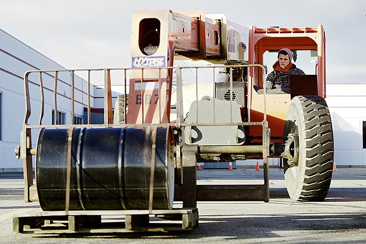 &lt;p&gt;JEROME A. POLLOS/Press Tanner Spackman operates a forklift during a safety course during an industrial safety fair held Wednesday at the North Idaho College Workforce Training Center in Post Falls.&lt;/p&gt;